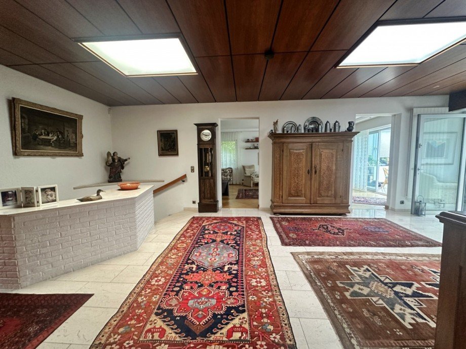 Wohndiele und Treppenabgang zur Linken Bungalow M�nchengladbach / Kamphausener H�he