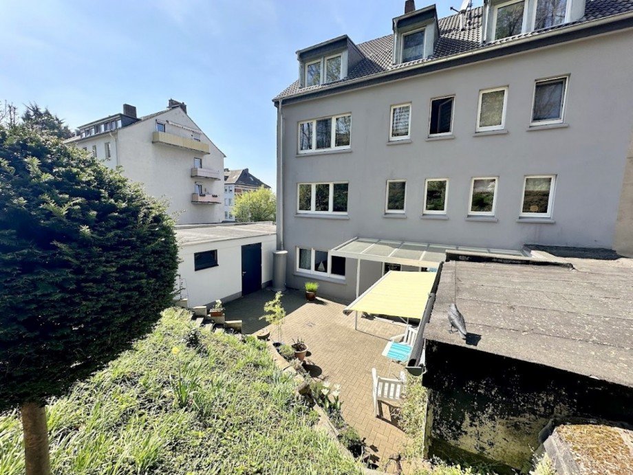 13. Au�enbereich mit Zugang Garage Mehrfamilienhaus M�nchengladbach